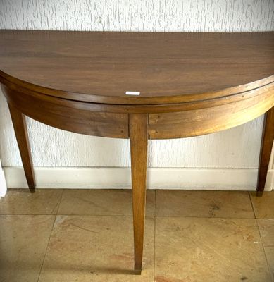 a wooden table with a white label on it