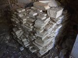a pile of bricks sitting on top of a pile of rubble