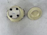 two cups and a saucer sitting on a table