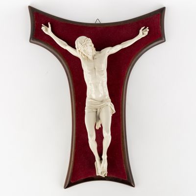 an image of a crucifix hanging on a wall with a red background
