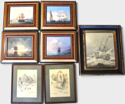 many framed pictures of ships on the wall