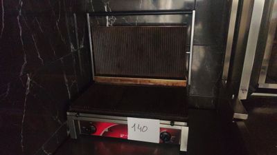 a sign on the back of a toaster oven