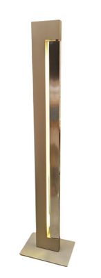 a tall metal pole with a light on top of it