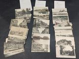 many old postcards with pictures on them on a table