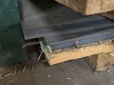 some pieces of wood are stacked on top of each other