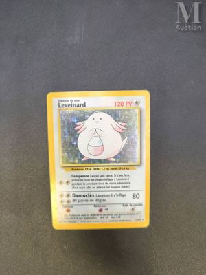 a close up of a pokemon card on a table