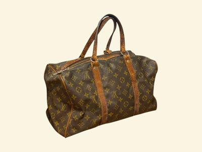 an image of a brown louis vuittou bag