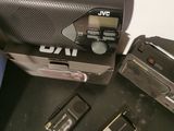 a camera and other electronics sitting on a table