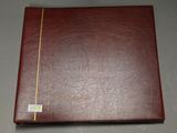an image of a brown binder with a yellow line on it