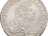 une pièce d'argent portant une tête de femme