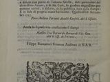 an open book with a drawing of a bird on it