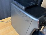 an image of a coffee machine on a wooden table