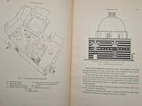 an open book with a drawing of a building on it