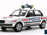 a toy police car with lights on top of it