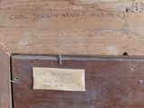 a label on a piece of wood that says carl st john arncl estate