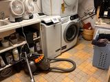 an image of a room with a washer and dryer in it