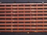a wooden fence that has been made to look like it ' s made out of wood