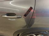 a sticker on the door of a car that has a sticker on it