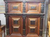 a large wooden cabinet that is sitting on a hard wood floor