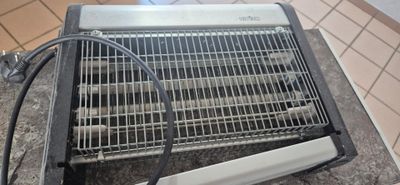 an image of a heater sitting on top of a counter
