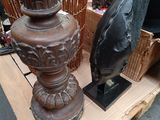 two vases that are sitting on a pallet