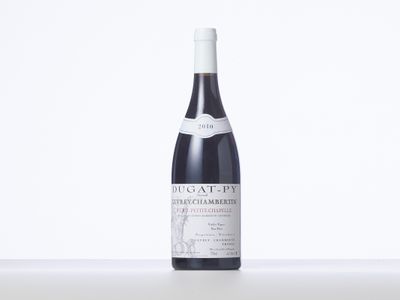 a bottle of wine that is sitting on a table