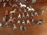 a lot of figurines that are on a table