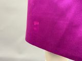 purple fabric with a hole in the middle of it