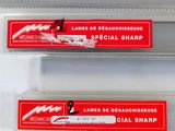 two blades of toothpaste are sitting on top of each other