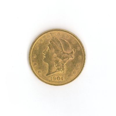 an image of a gold coin on a white surface