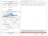 a close up of a document with a picture of a person on it