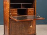 an old wooden desk with drawers and drawers on top of it