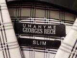 a close up of a shirt on a hanger