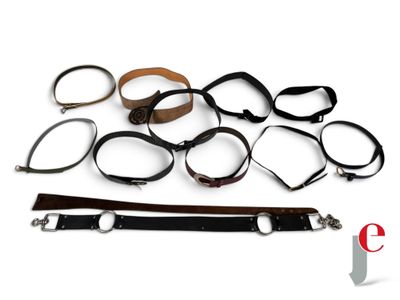 several different types of leather cuffs and cuffs on a white background