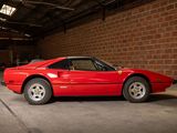 a red sports car parked in a garage