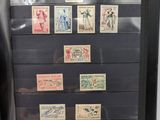 a picture of a display case with stamps on it