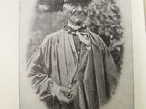 a black and white photo of a man in uniform