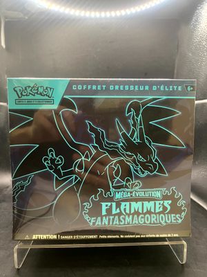 un gros plan sur une boîte de figurines Pokémon posée sur une table