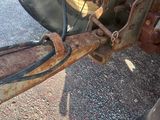 a close up of a rusted tire on a truck