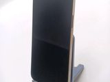 a cell phone that is sitting on a stand