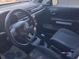 the interior of a car with a steering wheel and a dash board