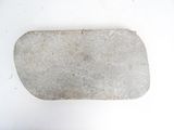 a large rock sitting on top of a white surface
