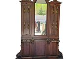 an image of a wooden armoire with a mirror