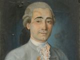 portrait d'un homme en costume bleu, portant une cravate en dentelle blanche