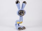 the toy is blue and has a black nose and legs