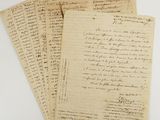 a pile of old letters sitting on top of each other