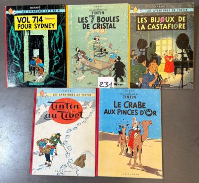 several children ' s books are lined up on a table