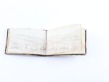 an open book that is sitting on a table