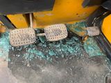 two pedals that are sitting on the floor of a vehicle