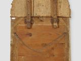 an old wooden mirror with a wooden frame and a metal handle